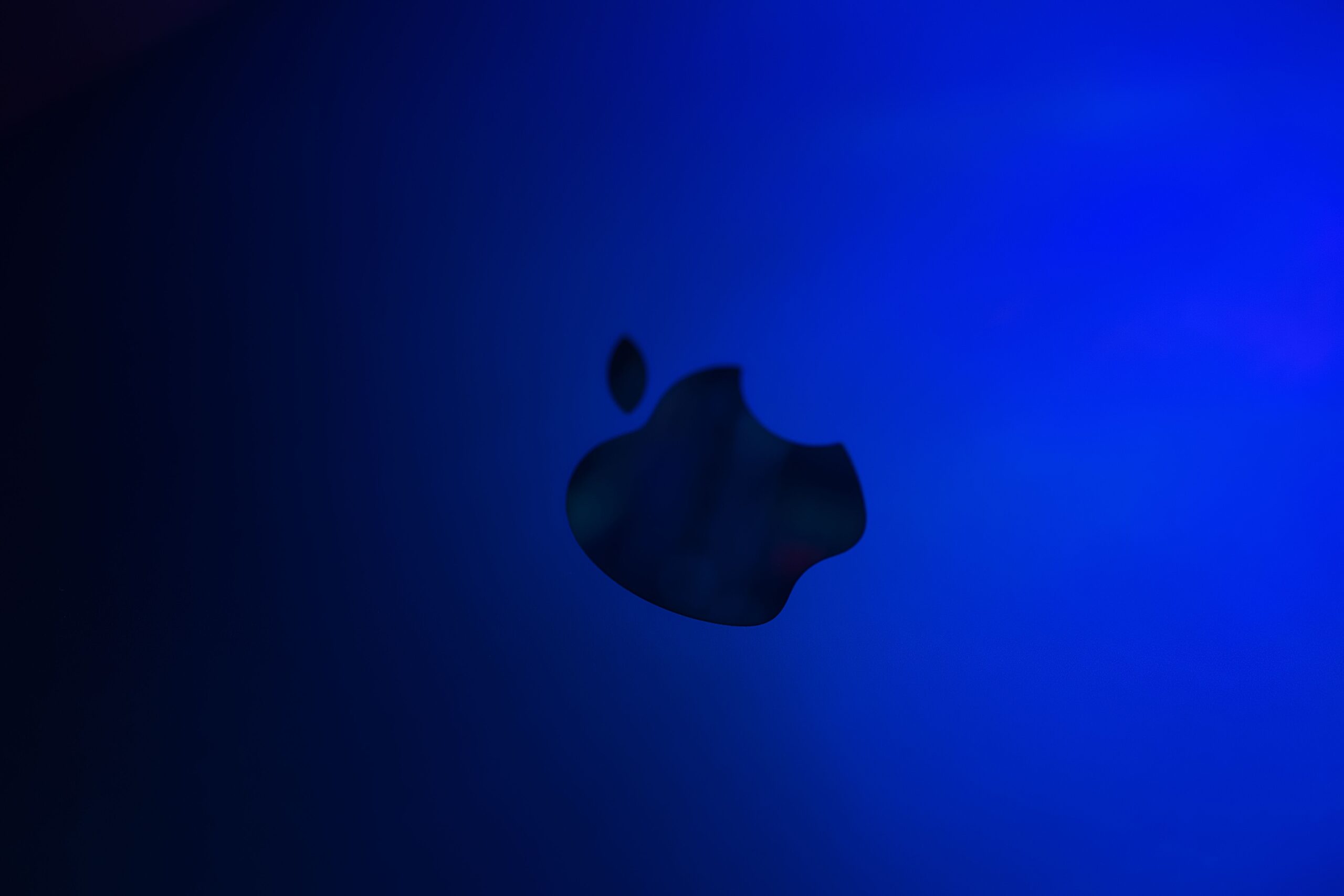 Amazon Soars Apple Sinks